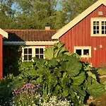 Red With Lush Gardens Near Arendal
