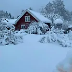 Red With Lush Gardens Near Arendal
