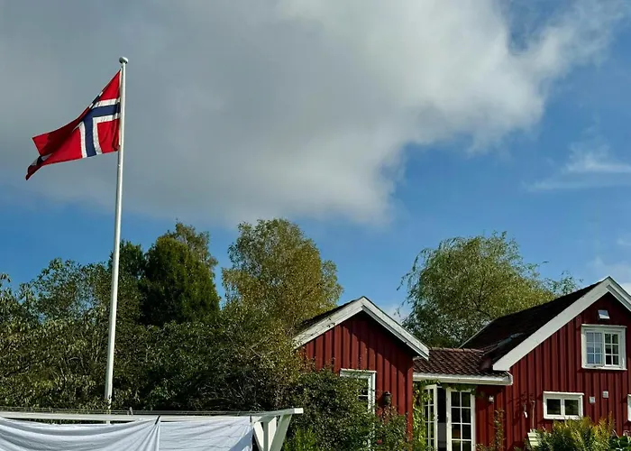 Red With Lush Gardens Near Arendal Eydehavn