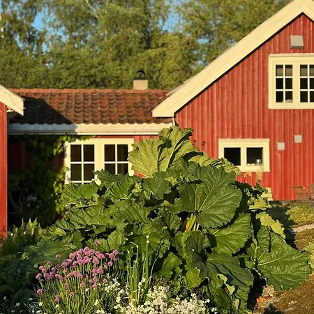Red With Lush Gardens Near Arendal