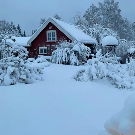 Red With Lush Gardens Near Arendal